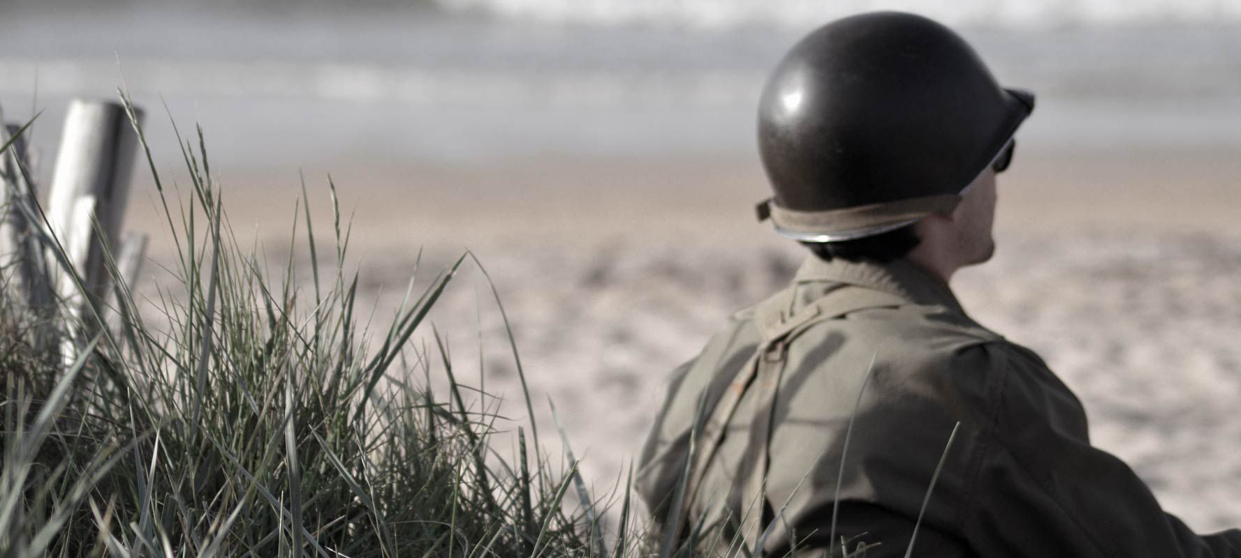 Soldier Reflecting On Beach